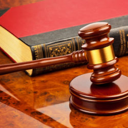 Signs You Need a Criminal Defense Attorney - gavel of a judge in court