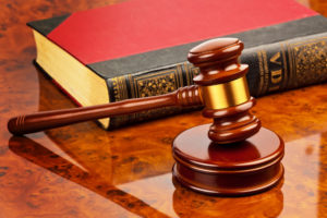 Signs You Need a Criminal Defense Attorney - gavel of a judge in court